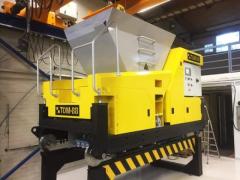 Machine for the production of hollow core slabs by extrusion